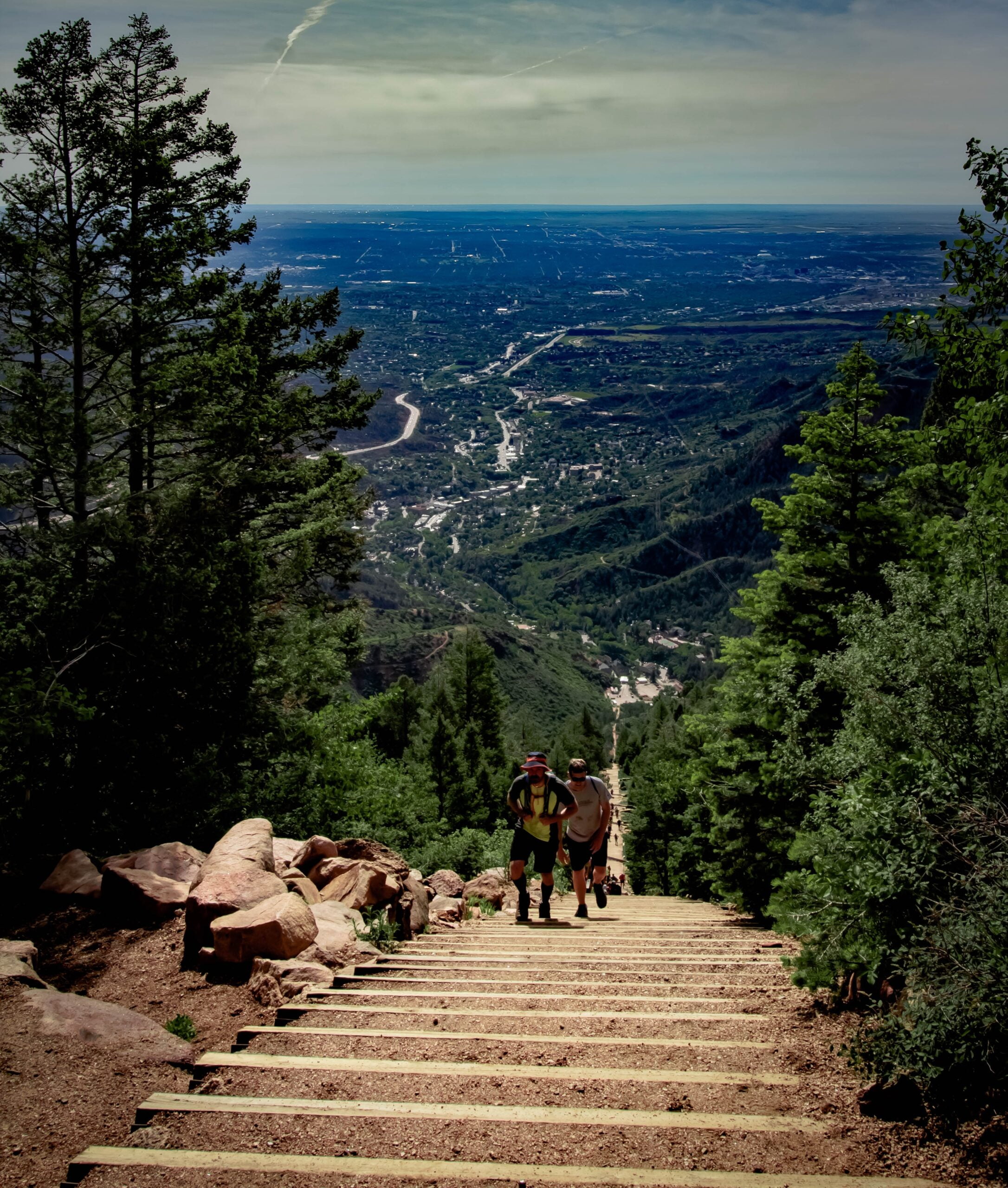Men walking up stairs with great view